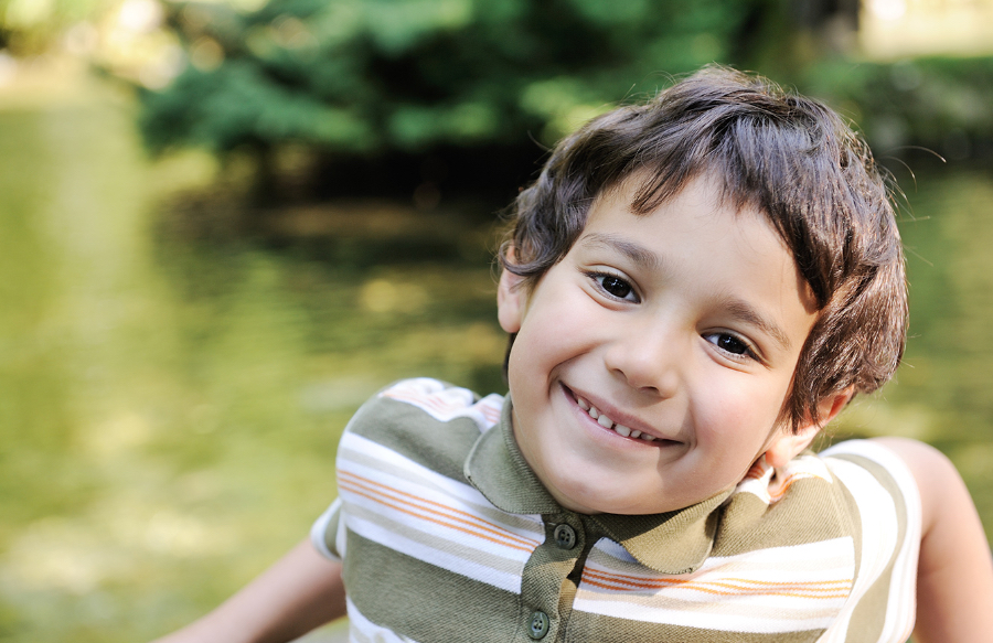 little boy smiling at camera