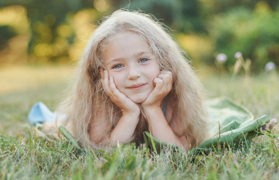 smiling little girl with backpack