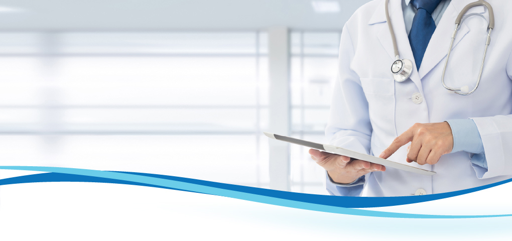 doctor looking at tablet doctor looking at tablet