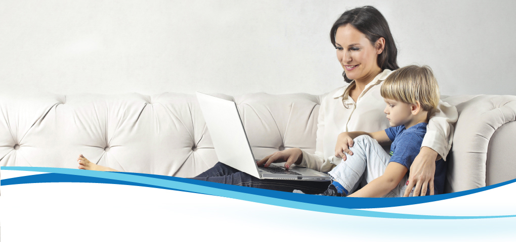 mother and son looking at laptop