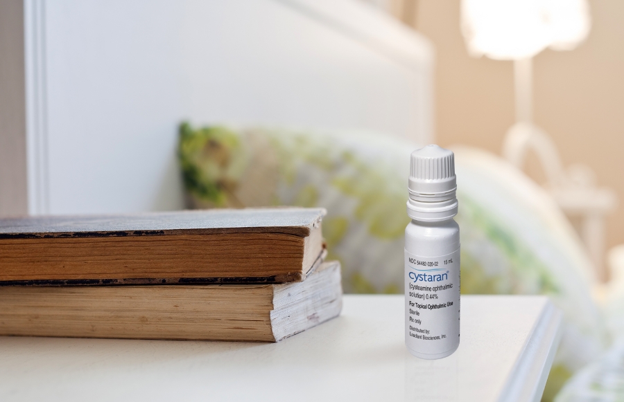 bookshelf with books and cystaran bottle bookshelf with books and cystaran bottle